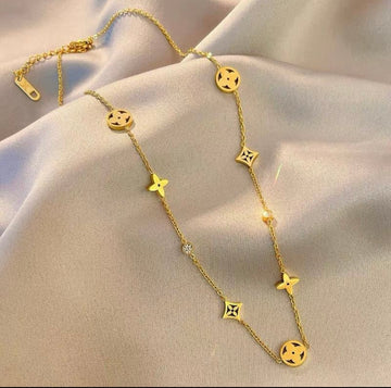 طقم قطعتين مطلي ماء الذهب