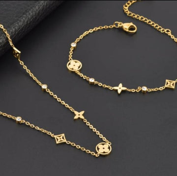 طقم قطعتين مطلي ماء الذهب